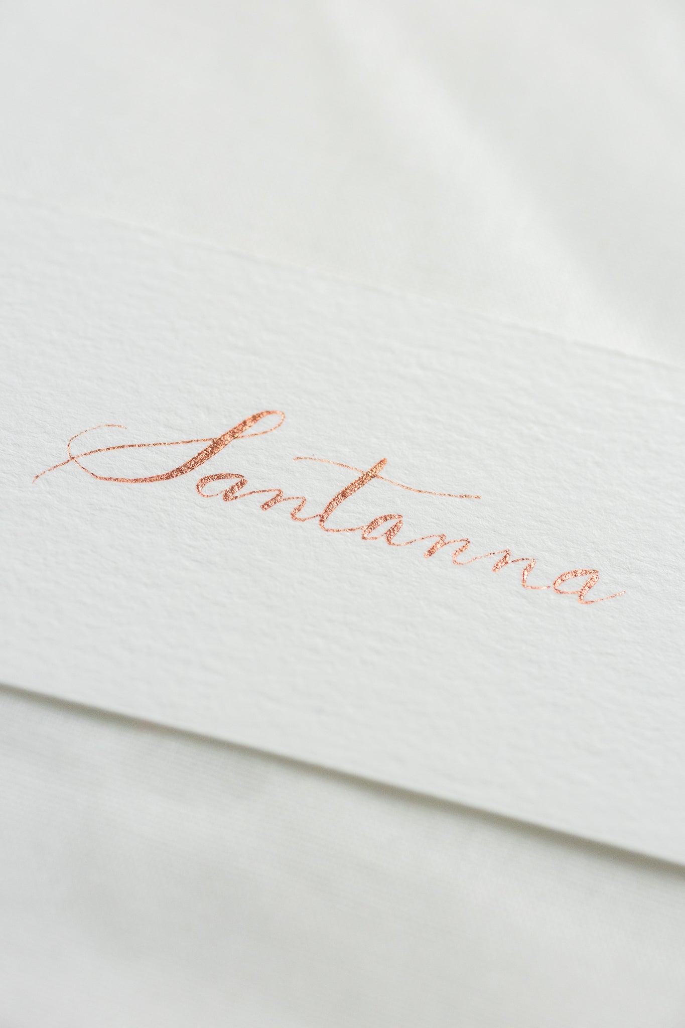 Place cards on natural white paper