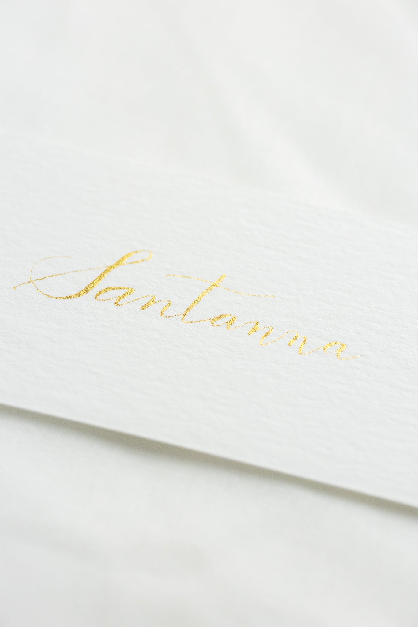 Place cards on natural white paper