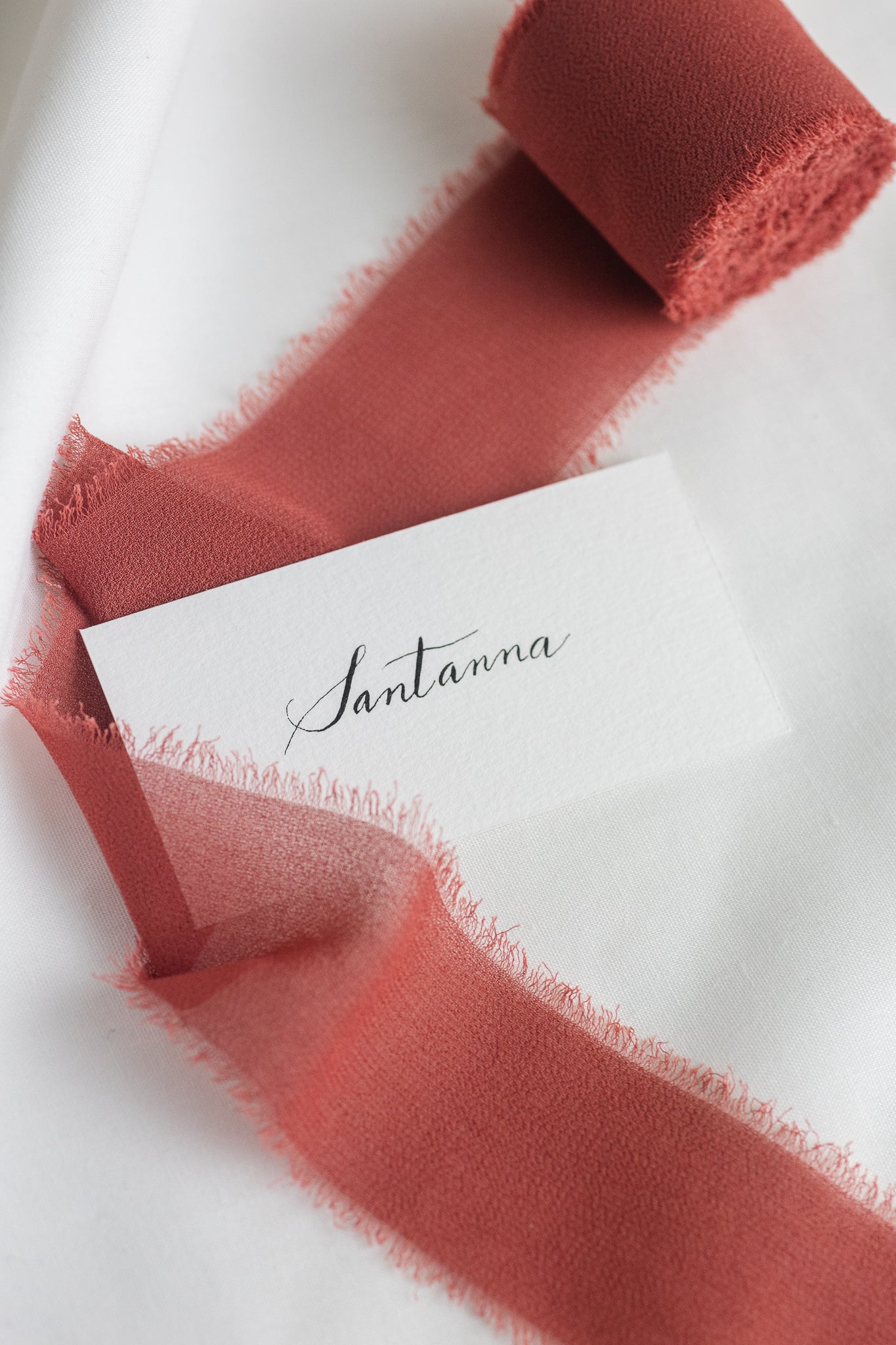 Place cards on natural white paper