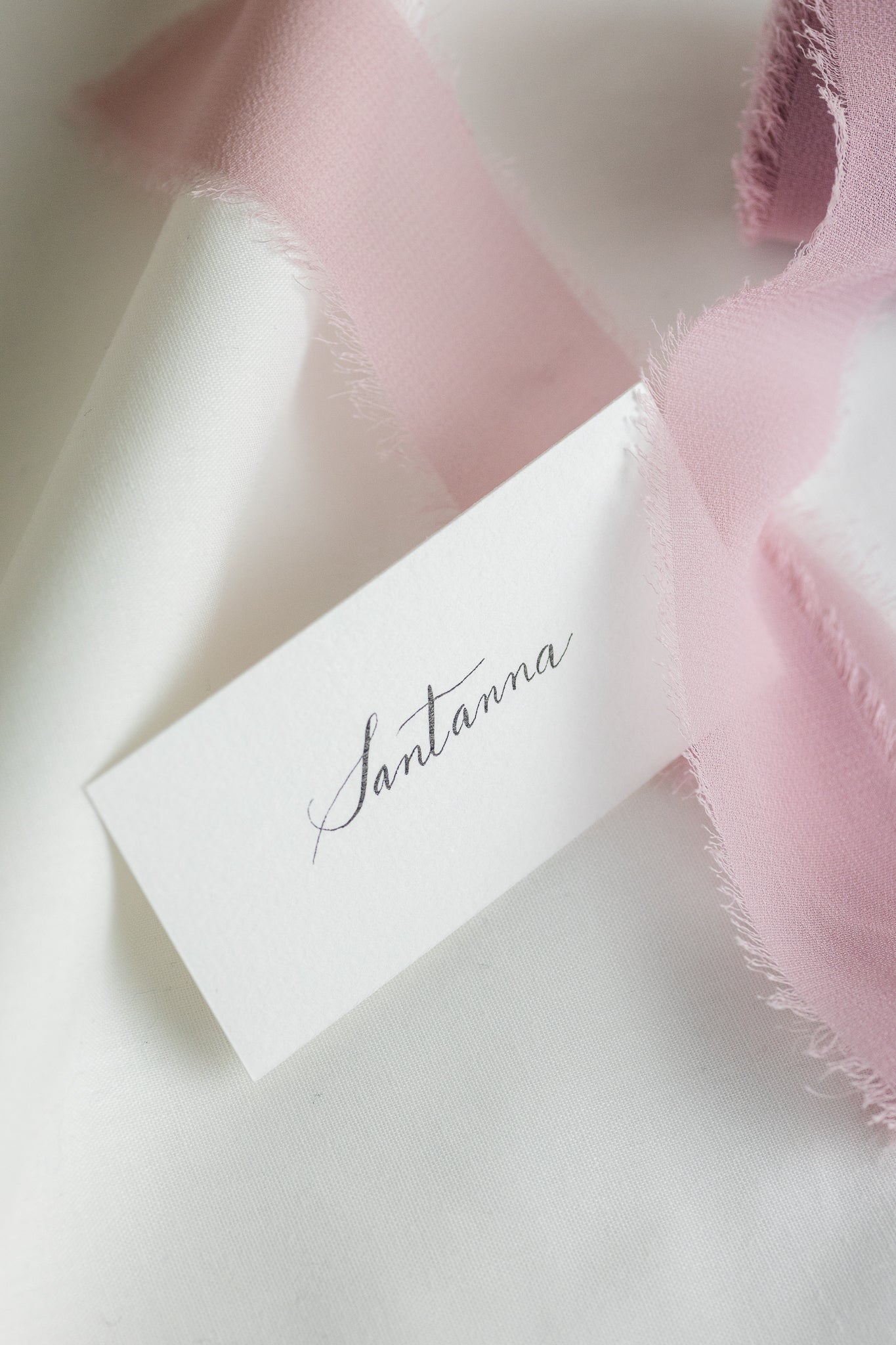 Place cards on natural white paper