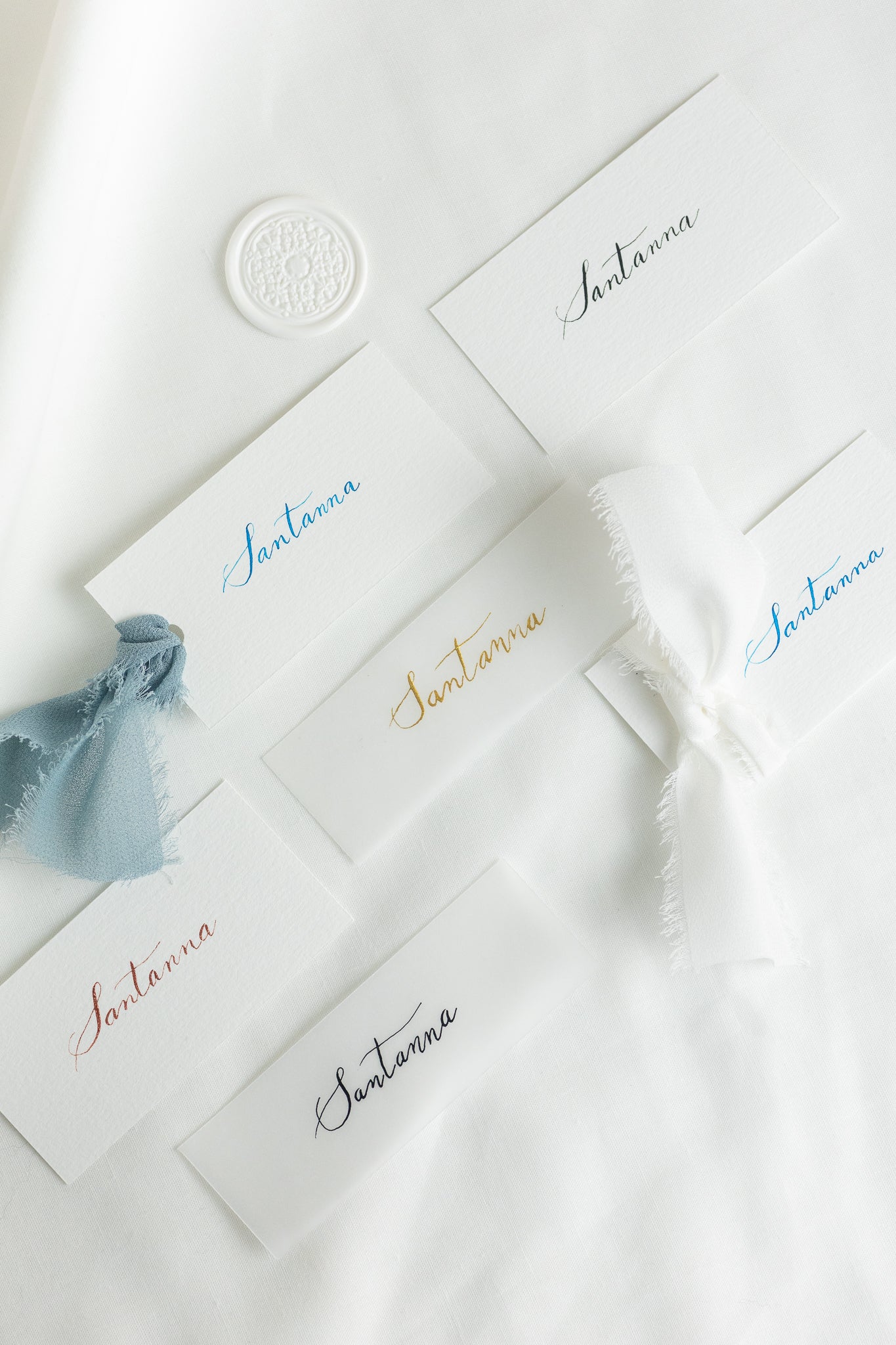 Place cards on natural white paper