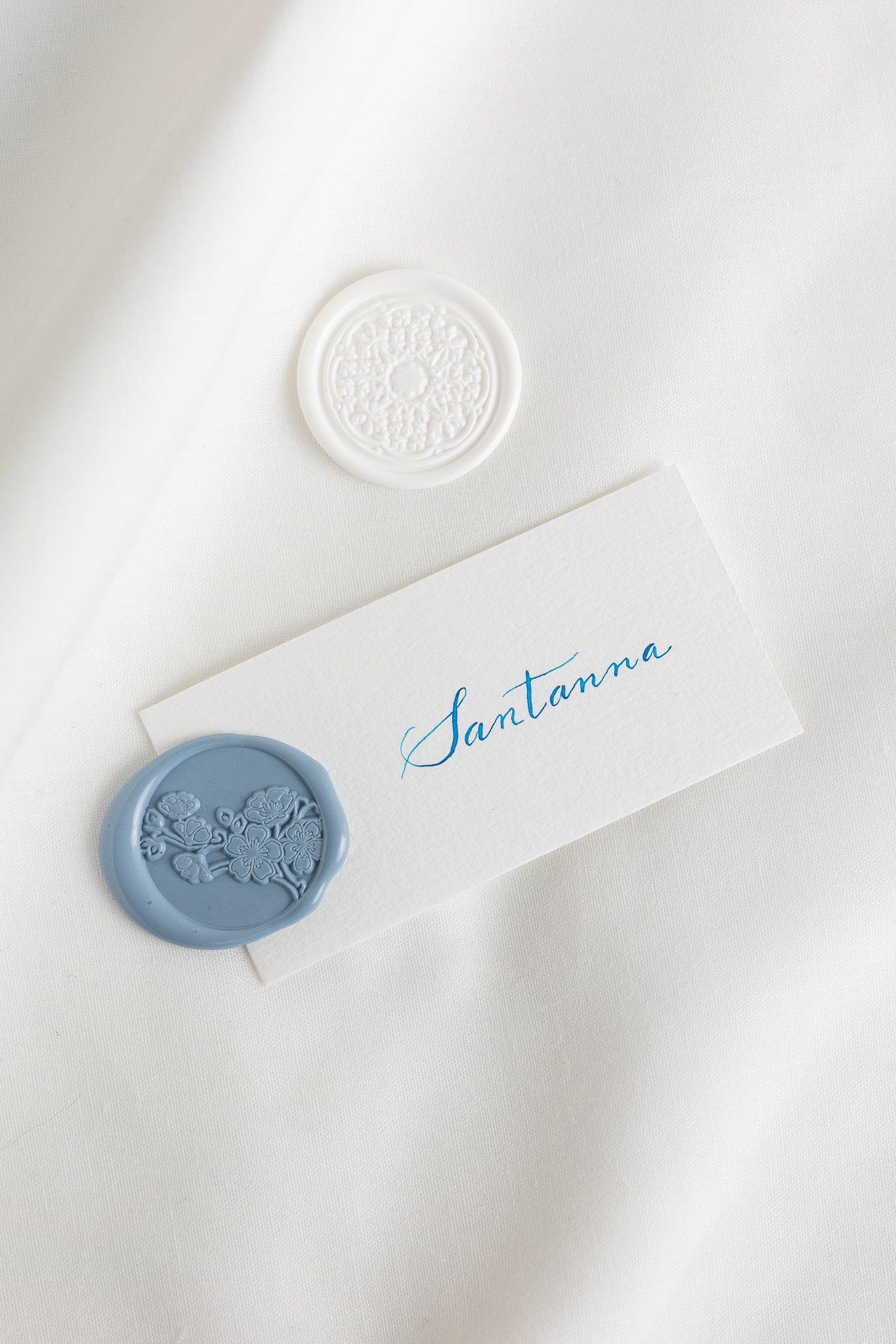 Place cards on natural white paper